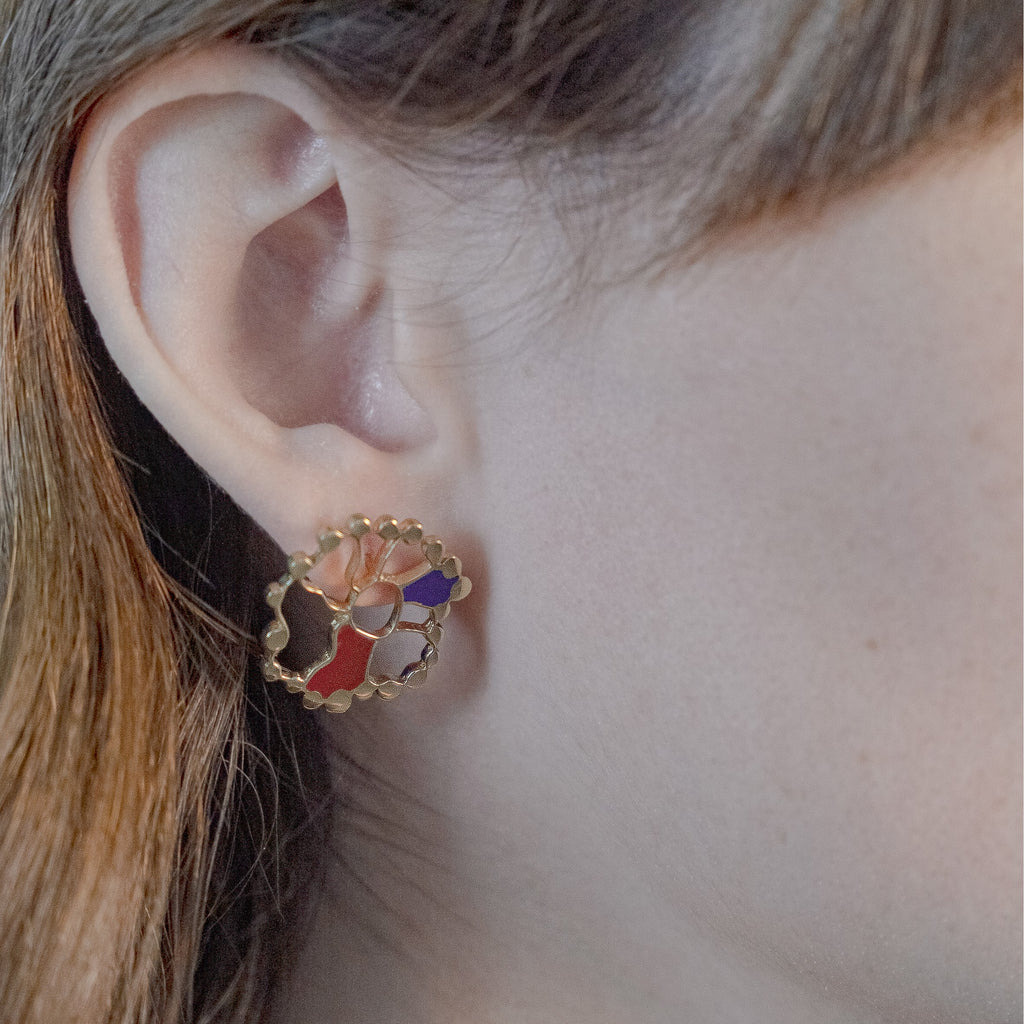 The Desert Wheel Earrings worn