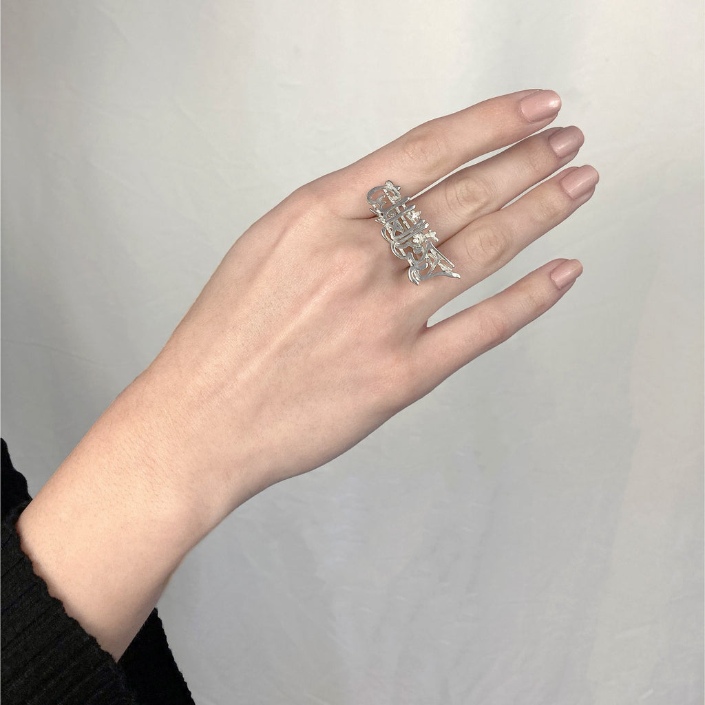 The Creed Ring worn